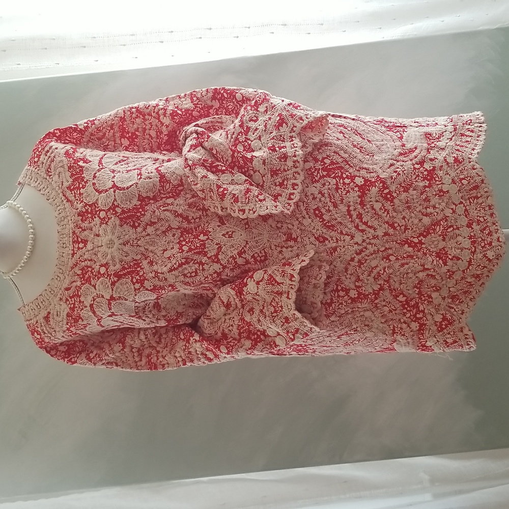 Very pretty blouse! Brand New No Tags Pretty Orange cream embroidery!